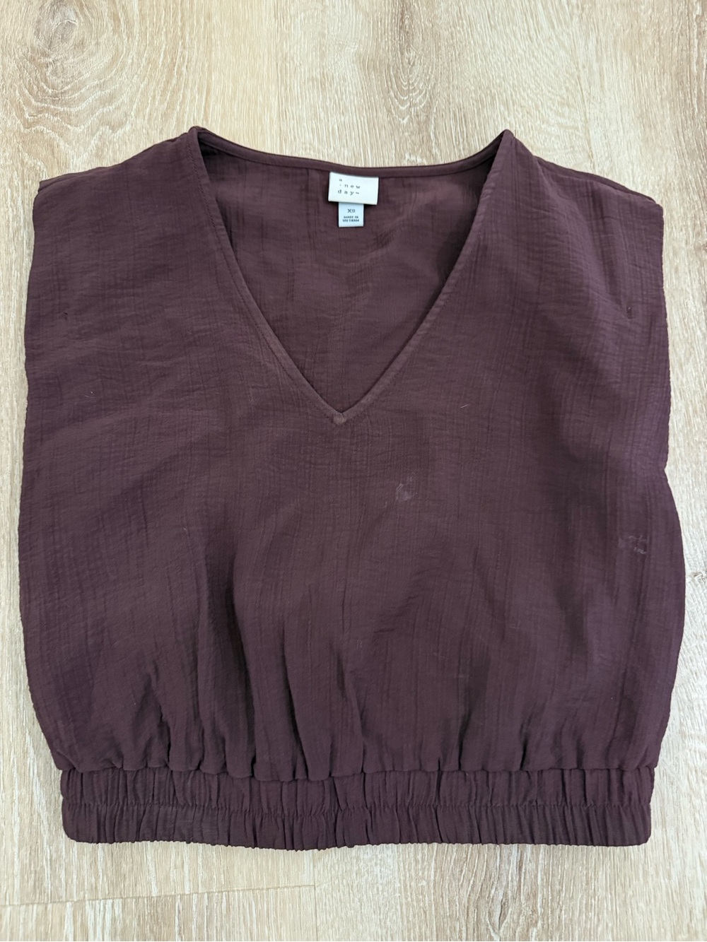 Sleeveless V-Neck Smocked Hem Top